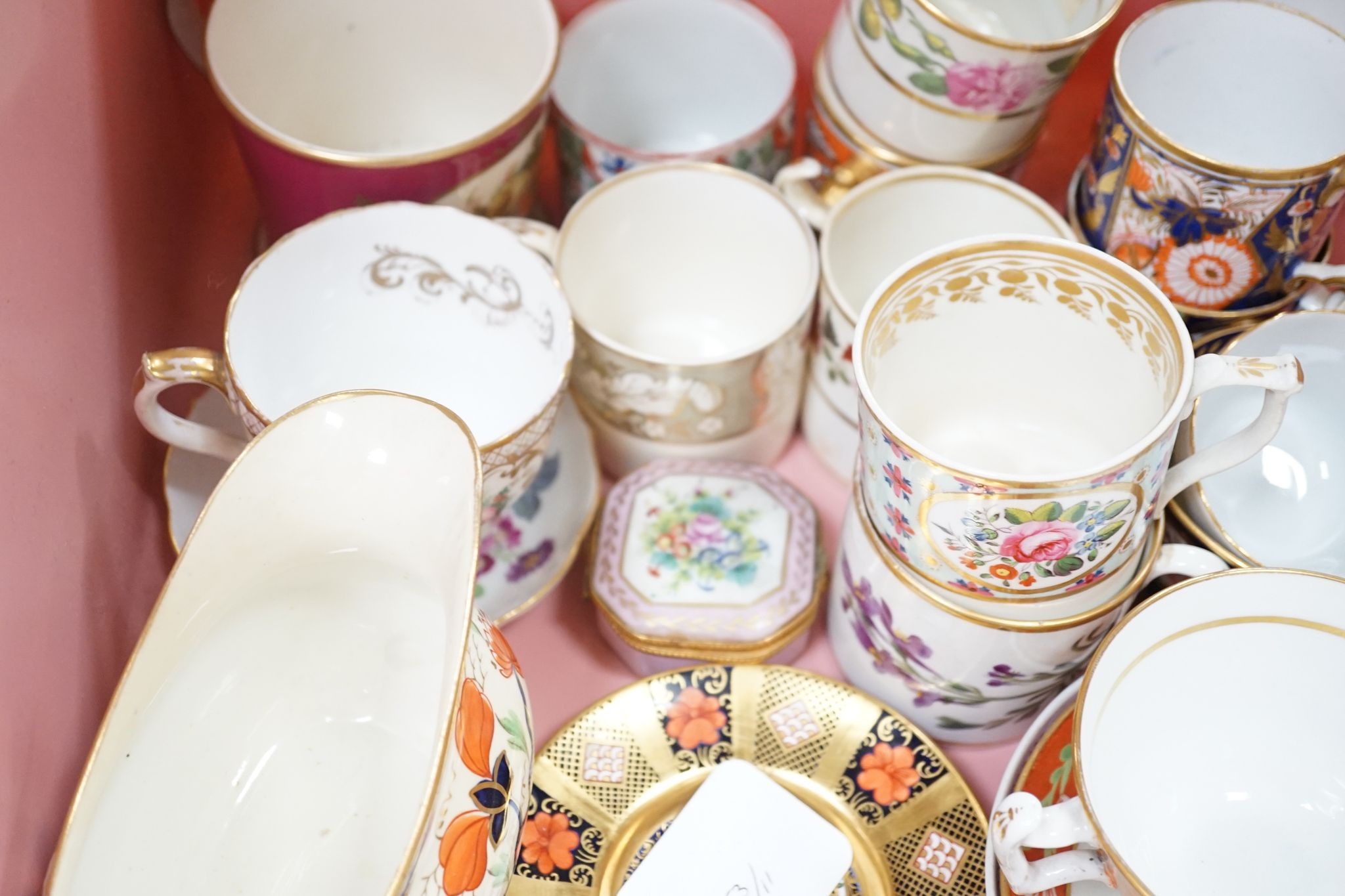 A collection of 19th century English porcelain tea and coffee cups, saucers and other tableware including Royal Crown Derby etc.